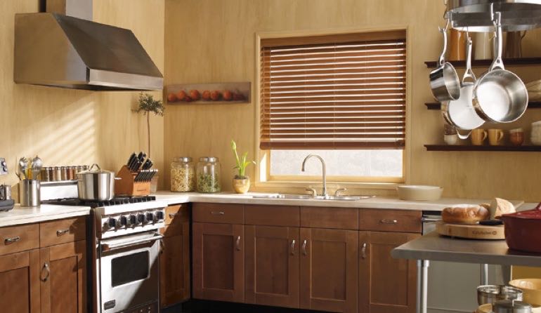 Charlotte kitchen faux wood blinds.